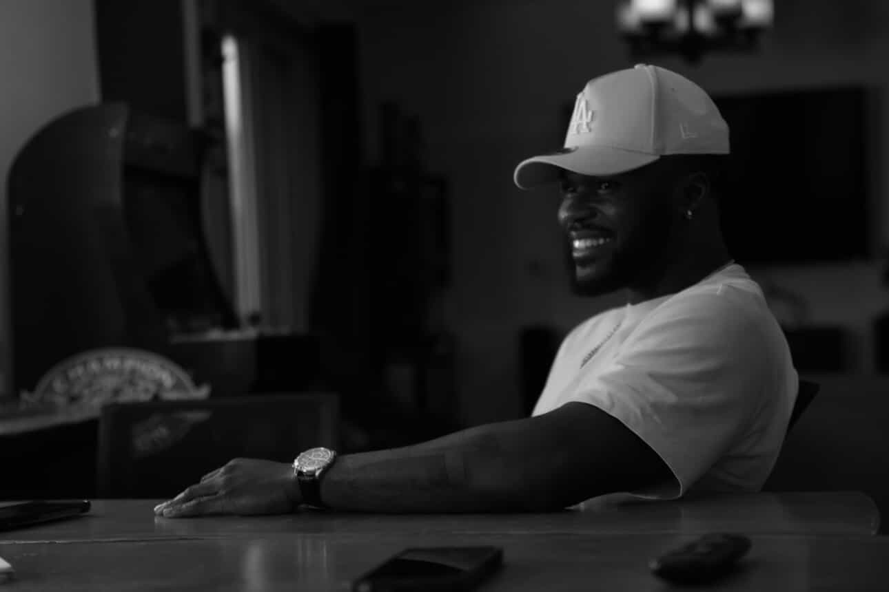 ELLI smiling during a studio conversation